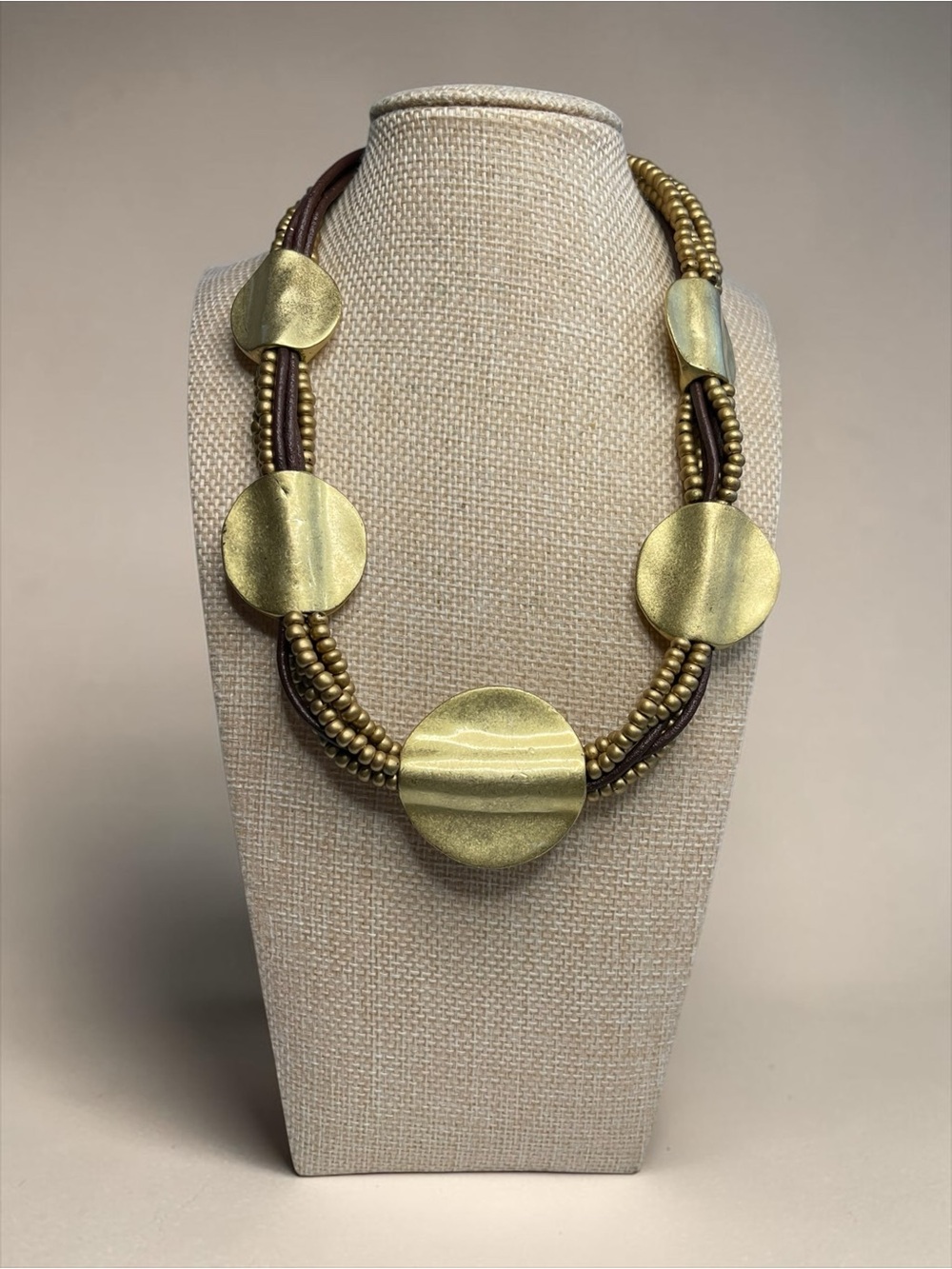 Graduated Brushed Gold Disc Multi Strand Statement Necklace Leather